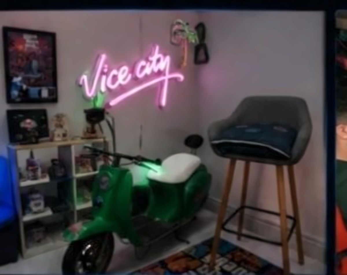 The Vice City corner with neon sign and green Vespa